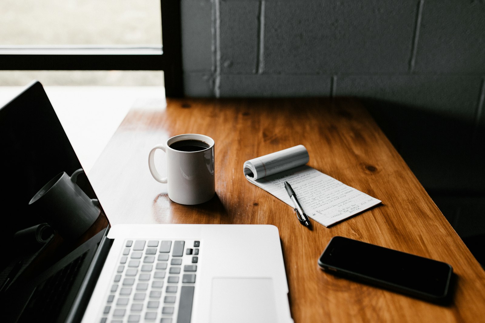 Blogger workspace with laptop and coffee